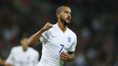 England's Theo Walcott celebrates after scoring for the team in their Euro 2016 qualifying win over Estonia on Friday night. Eddie Keogh / Reuters / October 9, 2015
