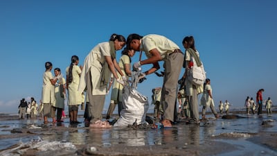Students from the Vivekanand Education Society clean Dadar Beach in Mumbai, India, in collaboration with environmental organisation Vanashakti. EPA