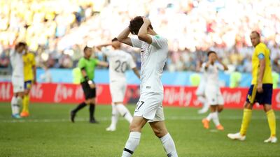 Lee Jae-Sung reacts during South Korea's match against Sweden. Clive Mason / Getty Images