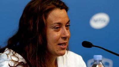 Marion Bartoli, announcing her retirement, won her only grand slam title after a record 47 appearances. Matthew Stockman / Getty Images / AFP