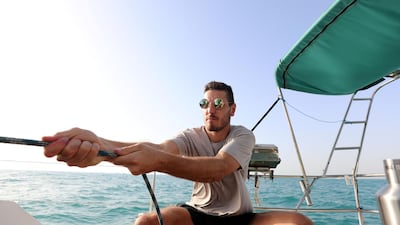 Matt Stone takes part in the Dubai Offshore Sailing Club pursuit race. Chris Whiteoak / The National