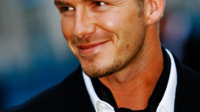 David Beckham, with a 'Peaky Blinders'-esque cut and cravat, attends the Sport Industry Awards at Old Billingsgate on March 29, 2007 in London, England. Getty Images