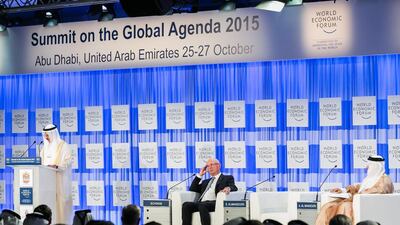 From left: Klaus Schwab, the founder and executive chairman of the World Economic Forum, Sultan Al Mansouri, the Minister of Economy, and Ali Majed Al Mansoori, the chairman of the Abu Dhabi Department of Economic Development and co-chair of the Summit on the Global Agenda, during the opening plenary. Courtesy World Economic Forum