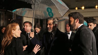 Wedding guest catress Jessica Chastain with Clooney and Affleck. EPA