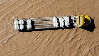 Vehicles are stranded after the Rio Grande overflowed following heavy rainfall along the US-Mexico border in Chihuahua state, Mexico. AFP