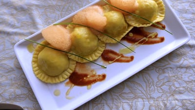 Home-made lobster ravioli with bisque on foam at Villa Toscana Restaurant at St Regis Abu Dhabi. Ravindranath K / The National