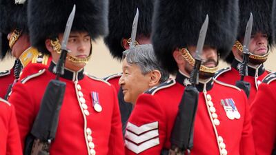 Japan's Emperor Naruhito inspects the honour guard on Horse Guards Parade in London during the ceremonial welcome for his state visit to Britain. AP