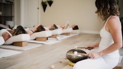 Bringing wellness elements into celebrations could include inviting friends to a private sound bath session. Getty Images