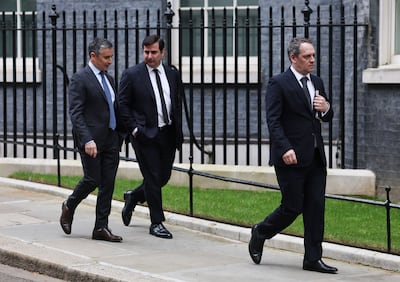 Ronan Harris from Snap, Wifredo Fernandez from X, and Alistair Law from TikTok leaving Downing Street on Thursday. EPA