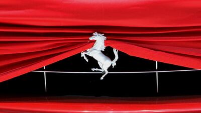 The iconic prancing horse of Ferrari is seen from a car on display at the Geneva Car Show. Denis Balibouse / Reuters