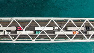 Lorries going into Canada wait on the Blue Water Bridge over the St Clair River, linking the US and Canada at Port Edward, Ontario, Canada and Port Huron, Michigan, US. Another bridge has been blocked by Canadian truckers protesting against a Covid-19 vaccine mandate. EPA