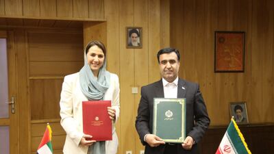 Mariam Al Mheiri signs an agreement with Dr Ali Salajegheh, vice president and head of the Department of Environment of Iran, over joint action on dust and sand storms. Wam