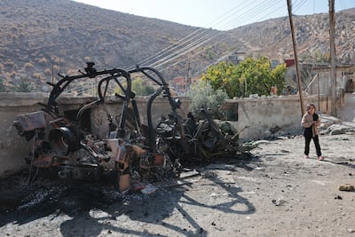 The remains of an Israeli military vehicle destroyed in the attack on Beit Jinn. EPA