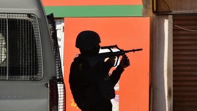 Tunisian special forces take position during clashes with militants in the southern town of Ben Guerdane, near the Libyan border, on March 7, 2016. Tunisian forces fought off fierce attacks from 'terrorists' near the Libyan border killing 28 extremist fighters in clashes that also left seven civilians dead. Fathi Nasri/AFP
