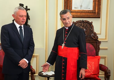 Suleiman Frangieh (left) with Maronite Patriarch Bechara Boutros Al Rai. Reuters