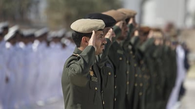 Members of the UAE Armed Forces participate in the Commemoration Day flag raising ceremony at Wahat Al Karama in 2016. Philip Cheung / The Crown Prince Court - Abu Dhabi