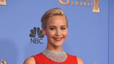 Jennifer Lawrence poses with the award for Best Actress in a Motion Picture, Comedy for her role in Joy, in the press room at the 73rd annual Golden Globe Awards. Frederic J Brown / AFP photo