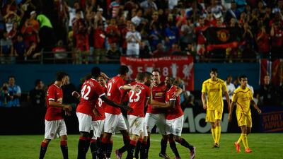 Juan Mata of Manchester United celebrates his goal with his teammates against Liverpool in the Guinness International Champions Cup 2014 Final at Sun Life Stadium on August 4, 2014 in Miami Gardens, Florida. United defeated Liverpool 3-1. Chris Trotman/Getty Images