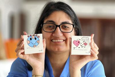 Asma Baker and Abdullah Lutfi are enjoying their new work space. Chris Whiteoak / The National