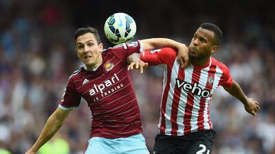 Stewart Downing of West Ham United battles with Ryan Bertrand of Southampton during their Premier League match on Saturday, which Southampton won 3-1. Jamie McDonald / Getty Images