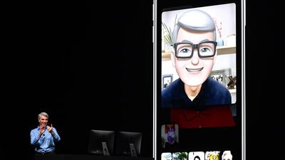 Apple CEO Tim Cook speaks using his Memoji during a group FaceTime call on stage during Apple's Worldwide Developer Conference. AFP