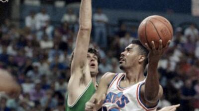 In this May 18, 1992 file photo, Cleveland Cavaliers forward John "Hot Rod" Williams (18) goes up for a shot against Kevin McHale of the Boston Celtics during a 122-104 NBA Eastern Conference semi-final win by Cleveland. Williams, a popular sixth man with the Cavaliers from 1986 to 1995, has died from cancer. He was 53. AP file photo