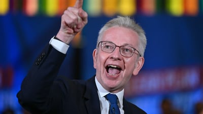 Britain's Levelling Up, Communities and Housing Secretary Michael Gove addresses the event. AFP
