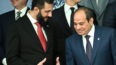 Syria's President Ahmad Al Shara, left, talks to Egypt's President Abdel Fattah El Sisi at a European Council meeting in Cyprus. AFP