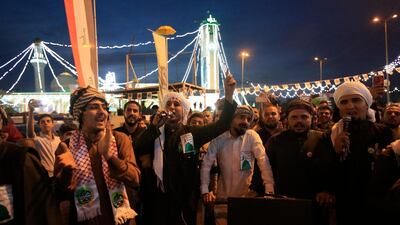 People gather to mark the birth anniversary of the Prophet Muhammad in the Adhamiyah neighbourhood in Baghdad, Iraq, Monday, Nov. 19, 2018. AP