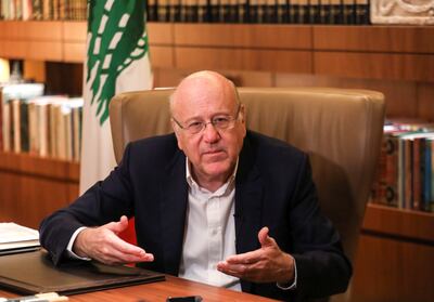 Lebanese Prime Minister Najib Mikati speaks during an interview with Reuters at the government palace in Beirut, Lebanon October 14, 2021. REUTERS