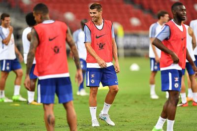 Alvaro Morata, centre, smiles during a Chelsea training session at National Stadium on July 24, 2017 in Singapore. Thananuwat Srirasant / Getty Images