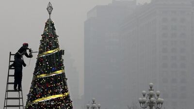Outdoor construction sites are ordered to close and some industrial plants told to cease or reduce operations. Andy Wong / AP Photo