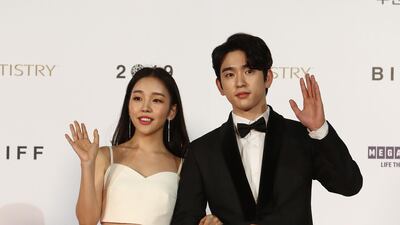 Actress Baek A-young and actor Jin Young arrive for the Opening Ceremony of the 24th Busan International Film Festival. Getty Images