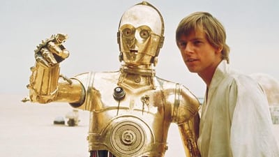 C3PO with Luke Skywalker, played by Mark Hamill. AP Photo/ Copyright 2004 Lucasfilm Ltd. & TM. All rights reserved