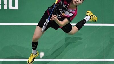 Sung Ji-hyun of South Korea plays a shot against PV Sindhu of India during the women's singles semi-final on Saturday. Stringer / AFP / December 17, 2016