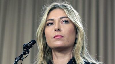 Maria Sharapova speaks at a 2016 news conference about her failed drug test at that year's Australian Open. She returns from a 15-month ban next week. Damian Dovarganes / AP file
