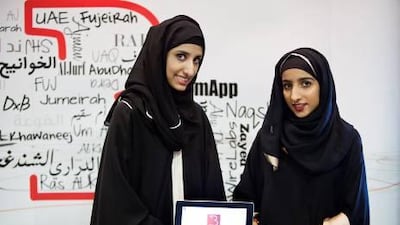 Fatima Al Ghaith, left, and Meera Al Siri have designed an application that allows users to upload photos and rate places throughout the UAE.