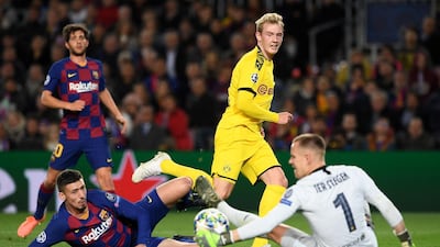 Barcelona goalkeeper Marc-Andre Ter Stegen saves from Dortmund's Julian Brandt. AFP