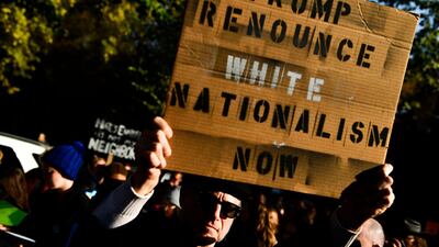 People protesting against US President Donald Trump wait near the Tree of Life Congregation on October 30, 2018 in Pittsburgh, Pennsylvania. AFP