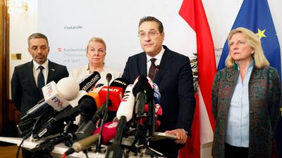 Austria's Vice-Chancellor Heinz Christian Strache of the Austrian Freedom Party resigns at a press conference as Interior Minister Herbert Kickl (L), Labour Minister Beate Hartinger-Klein (2-L), and Foreign Minister Karin Kneissl (R) listen. EPA