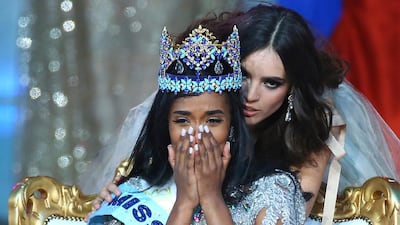 Winner of Miss World 2019, Toni-Ann Singh of Jamaica is crowned by reigning Miss World, Vanessa Ponce de Leon from Mexico . AP