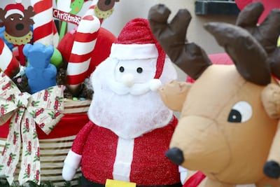 Lollipops, inflatable Santas, reindeer and polar bears in the backyard. Chris Whiteoak / The National