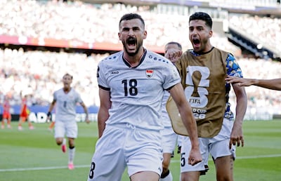 Iraq's Aymen Hussein celebrates scoring against Norway. Reuters