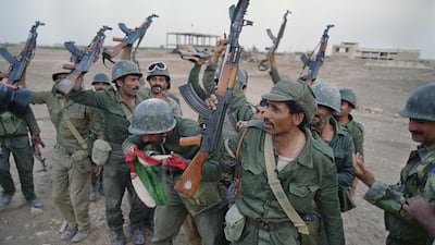 Iraqi soldiers celebrate their victory over Iran in the strategic Al Faw peninsula of south Iraq on April 20, 1988. AFP