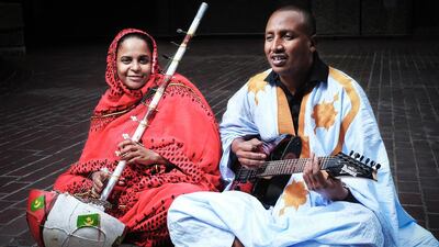 The Mauritanian singer and musician Noura Mint Seymali with her husband and bandmate Jeiche Ould Chighaly, backstage at the Barbican Centre in London. Dave Stelfox for The National
