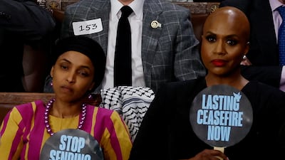 Democratic members of the House of Representatives Ilhan Omar, left, and Ayanna Pressley show their opposition to the US policy on Gaza. Reuters