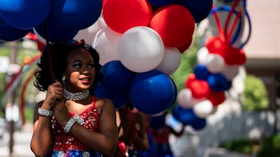 A member of the Dance4Life dance studio prepares to march ahead of an July 4 parade in Philadelphia. Getty Images via AFP