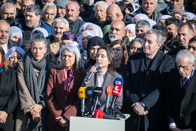 Tulay Hatimogullari, co-leader the Peoples' Equality and Democracy Party, speaks during a demonstration in support of Syrian Kurds in Nusaybin, south-east Turkey. EPA