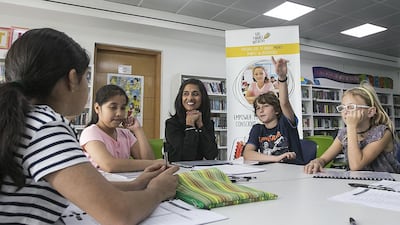 The Kids Finance Initiative teaches children ages 9 to 14 how to manage their money responsibly. Mona Al Marzooqi / The National