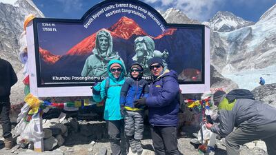 From left to right: Alla Krasiukov, Ivan Krasiukov, grade one pupil at Bloom World Academy, and Dmitrii Krasiukov at Mount Everest base camp.